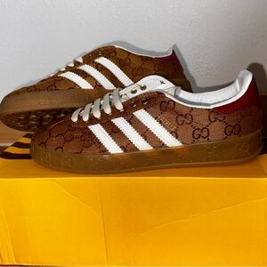 Never worn Gucci x Adidas sneakers